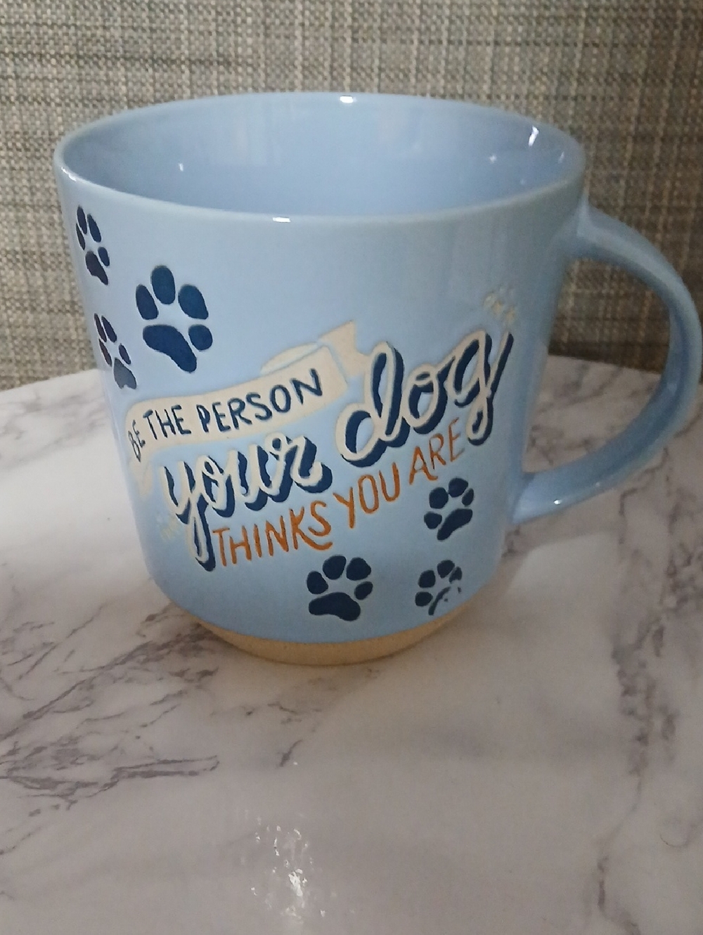 Light Blue Ceramic Dog Mug with Paw Print Design